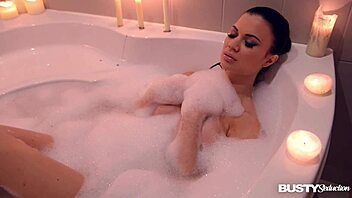 Jasmine Jae seducing in the bath, big tits on display! 😍