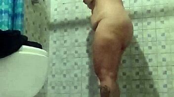 Hidden Camera Catches Mature Stepmom Flashing Big Tits in Bathroom. Latina Milf Exposed!