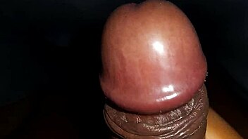Watch a black cock cum from a homemade handjob.