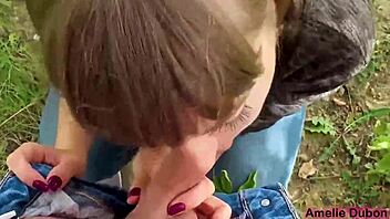 Young girl sensually sucks boyfriend's cock outdoors