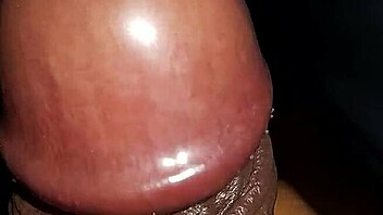 Watch a black cock cum from a homemade handjob.