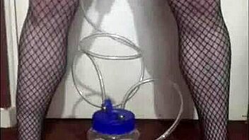 Straight and bi males try out a portable cow milking machine in this amateur video