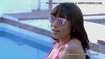 Slutty teen in bikini gags on monster black cock during interracial deepthroat.