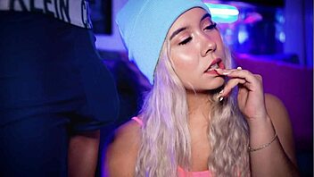 Blonde college coed teases boyfriend's cock over boxers.