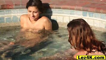 Gorgeous Lesbians Kiss and Finger Each Other in Pool Love