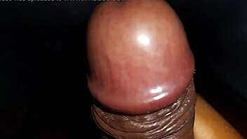 Watch a black cock cum from a homemade handjob.