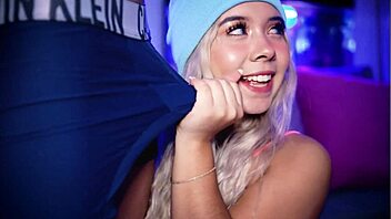 Blonde college girl teases her boyfriend through his shorts