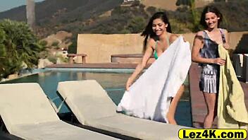 Gorgeous Lesbians Kiss and Finger Each Other in Pool Love