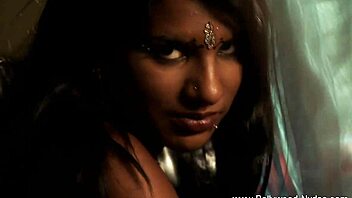 A Pretty Indian Brunette Babe Dances And Teases With Striptease