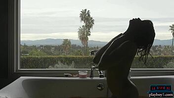 Tall black milf model ana foxxx strips in heels. She undresses and takes a hot bath solo