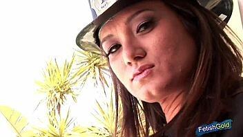 Female firefighter does hot outdoor striptease