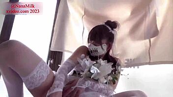 Beautiful Asian bride-to-be gets a nice cum shower in her wedding dress