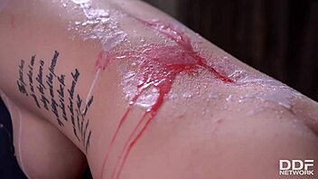 dominant client interacts with fetish prostitute satin bloom