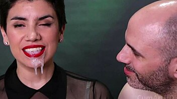 look at the cum dripping from her mouth