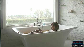 Tall black milf model ana foxxx strips in heels. She undresses and takes a hot bath solo