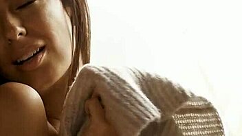 Perfect brunette babe gives a striptease and poses outdoors with ripped clothes