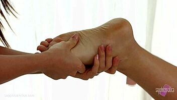 Asian beauty indulges in sensual lesbian love making
