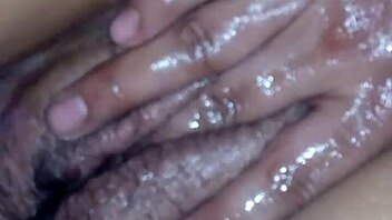 Close up of clitoris while masturbating.