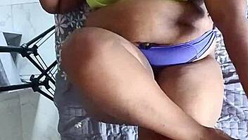 Tattooed ebony woman gives blowjob in airbnb