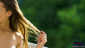 Perfect brunette babe gives a striptease and poses outdoors with ripped clothes