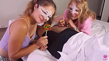 Two girls love sucking lollipops and other things as well