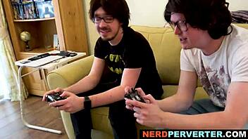 A blonde adult film star gives a hardcore blowjob to two men at once