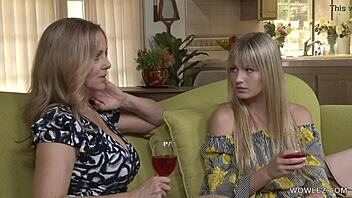 Julia Ann explores first lesbian licks with Scarlett Sage in bed