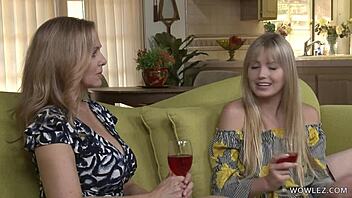 Julia Ann explores first lesbian licks with Scarlett Sage in bed