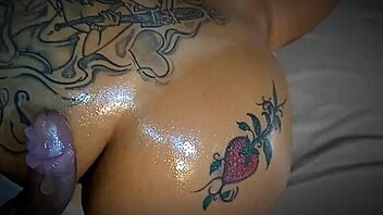 I'm stunned watching this Latina with big tits suck and get her ass oiled up by a horny guy!