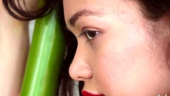 petite asian teen 18+ kit rysha strips bare, showing natural curves.