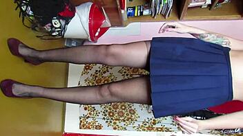 Custom video showing legs in skirt, stockings, and shoes.
