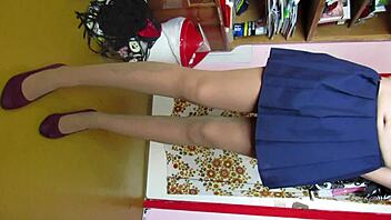 Custom video showing legs in skirt, stockings, and shoes.
