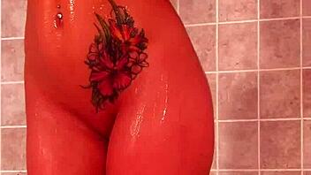 Busty Jayden Jaymes gets her pussy wet while masturbating.