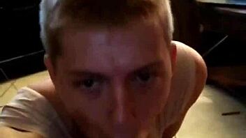 Brandon, a submissive man, gives oral sex to a well-endowed man