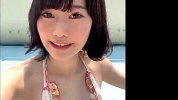 Japanese sexy dance with big boobs at the pool.