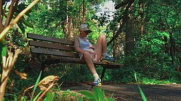 She reaches orgasm in the forest.