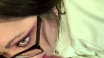 Sexy brunette plays with dildo toy.