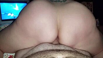 she rides his cock while watching the football game