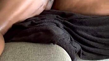 Playtime on the couch with oil and pussy massage