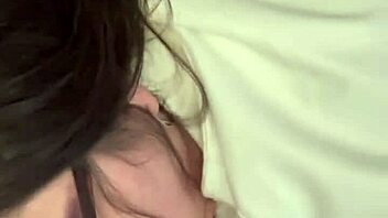 Sexy brunette plays with dildo toy.