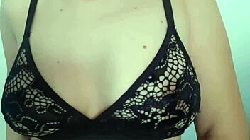 Woman plays nipples game in lingerie with big tits