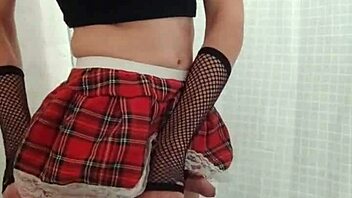 This teen crossdresses and plays with his gay pussy solo in the video.