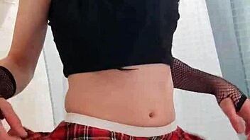 This teen crossdresses and plays with his gay pussy solo in the video.