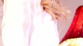 Busty Brett Masturbates In Red High Heels