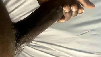 Close up and personal look at an ebony beauty enjoying self-pleasure