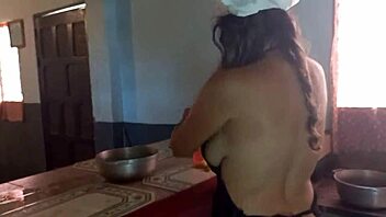 Big tits and a wet pussy in the kitchen
