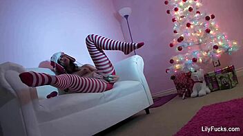 Lily Carter masturbates her pussy and ass, squirting happily for christmas – want to see her tits?