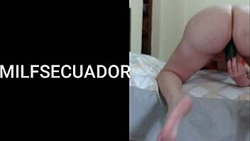 latina milf uses cucumber for solo fun.