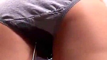 This blonde girl is peeing in her panties, what a naughty sight