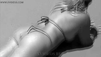 My wife shows off her body on Brazilian beaches. She's teasing in public.